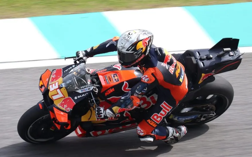 Pedro Acosta riding a KTM MotoGP bike on track