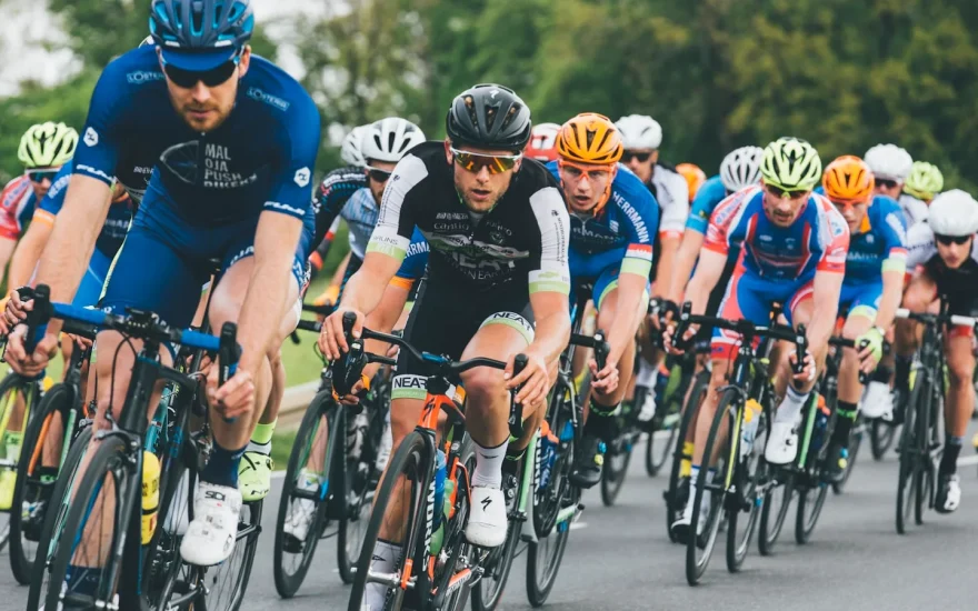 Pack of athletes racing closely together