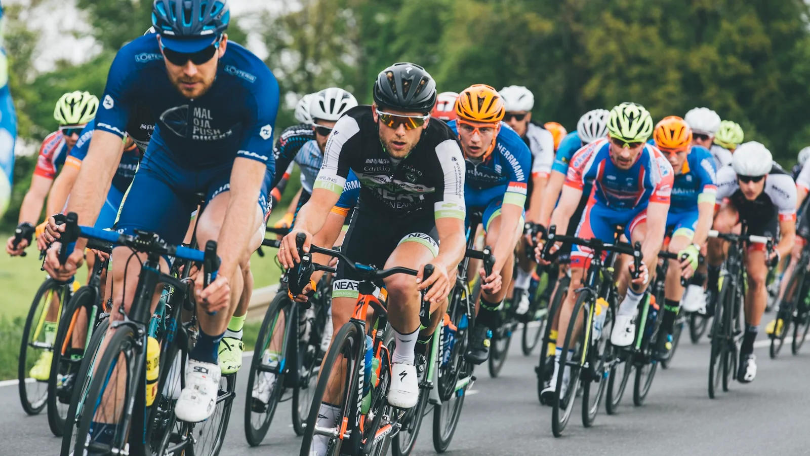 Pack of athletes racing closely together