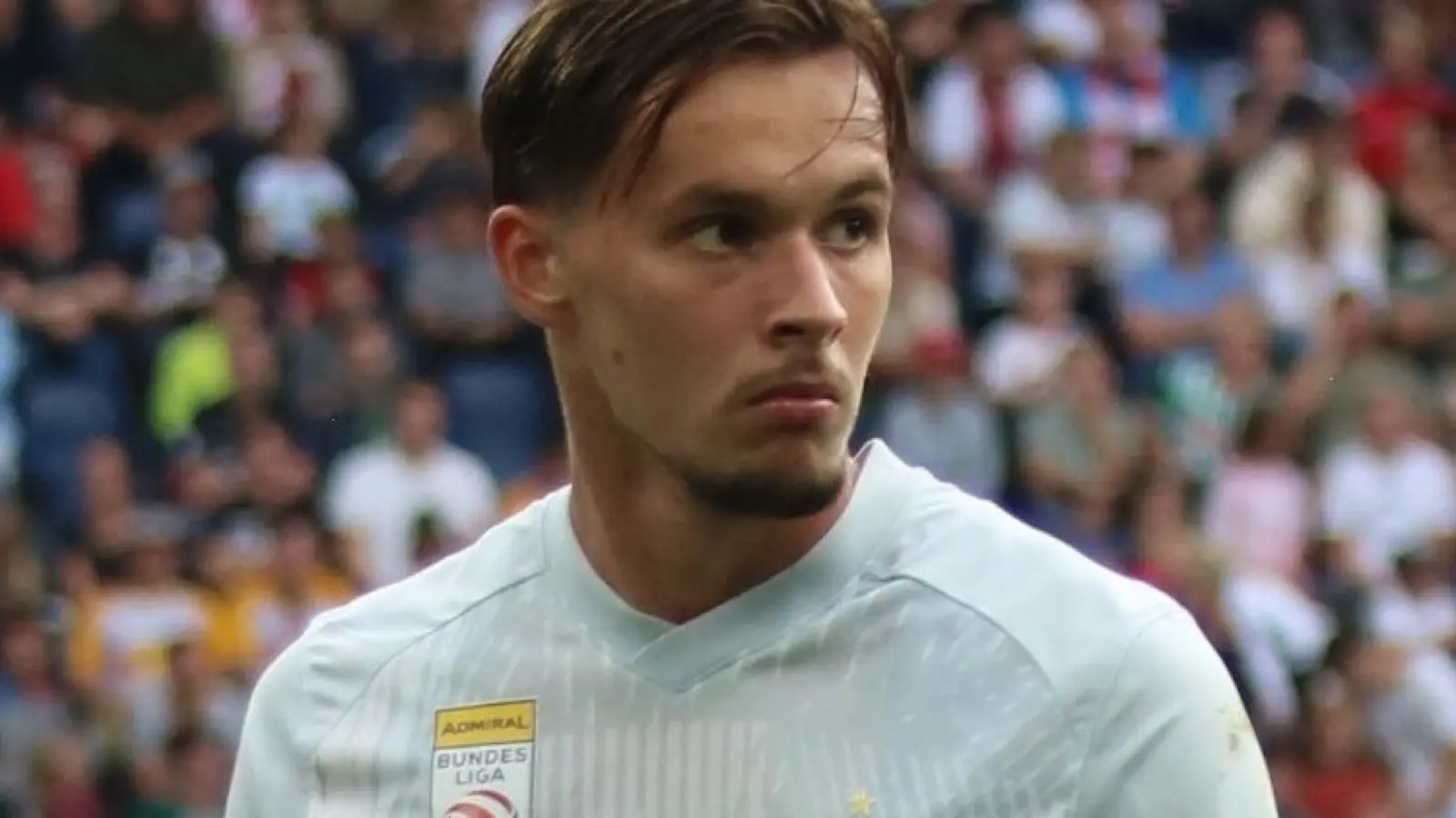 Amar Dedic wearing a Red Bull Salzburg shirt during a Bundesliga match in September 2023