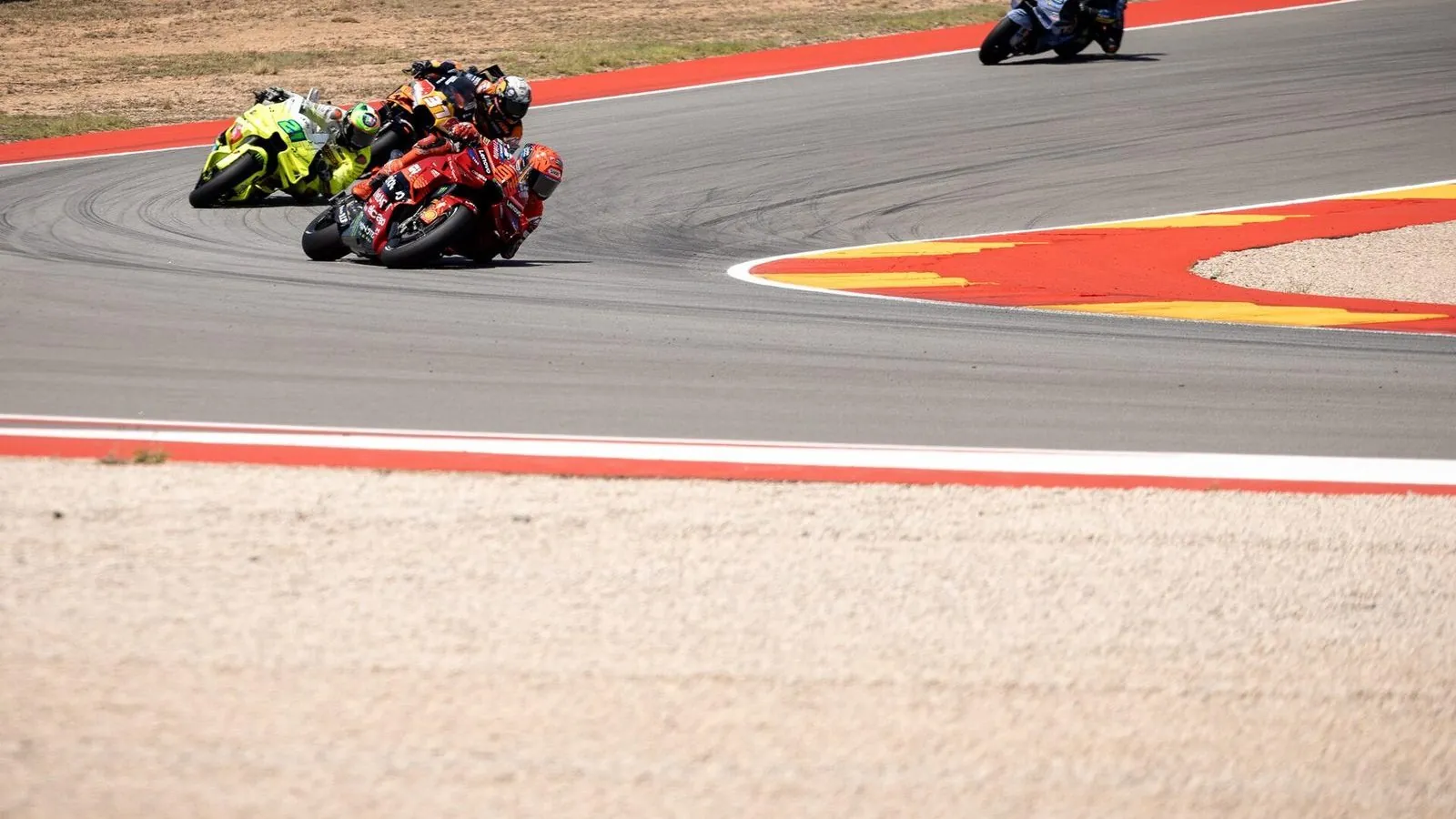 Contextual image: Marc Márquez leading the pack during the 2025 Aragon motorcycle Grand Prix