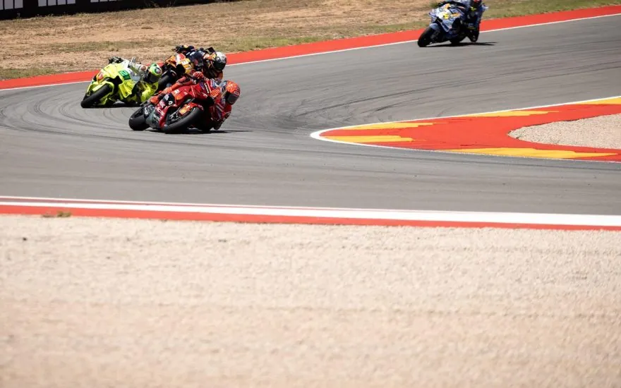 Contextual image: Marc Márquez leading the pack during the 2025 Aragon motorcycle Grand Prix